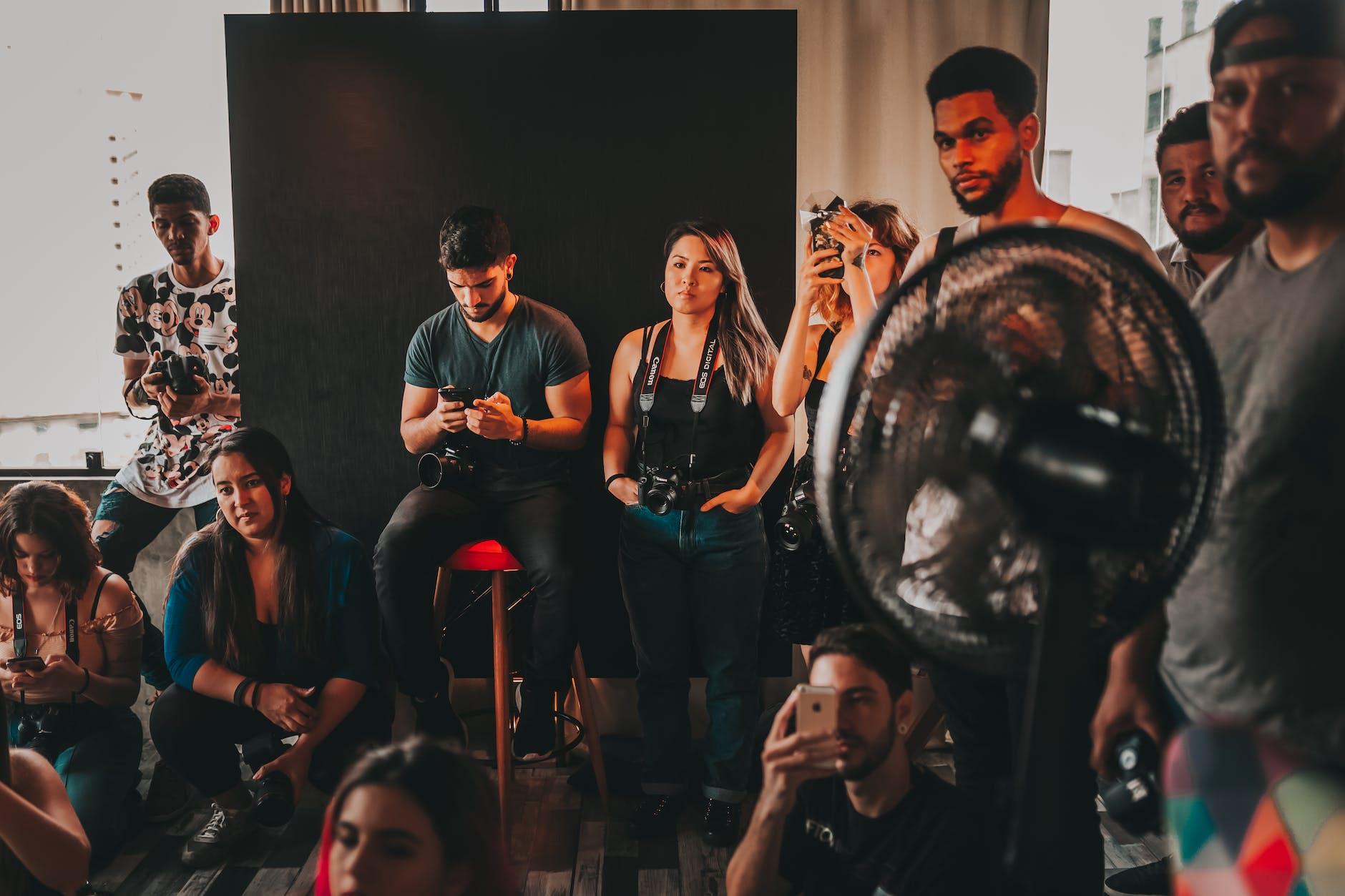 diverse colleagues at backstage of photo session