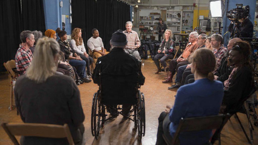 Diverse Cast: "Group of actors from different age groups and backgrounds", "Actor in wheelchair speaking on set"