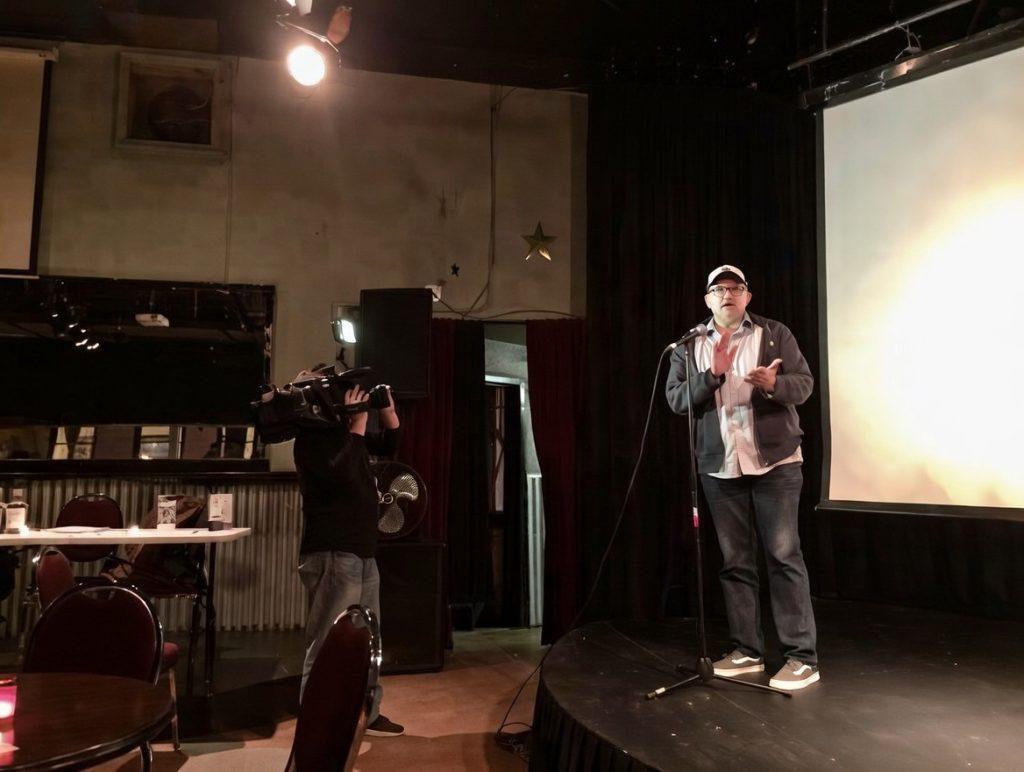 Trent Peek (@swoop1138) in action, pitching the film Racing Time during a session at the Austin Film Festival—likely in one of their famous Pitch Competitions, where writers get a tight window (often 90 seconds) to present their screenplay or concept to a panel of industry jurors like agents, producers, and managers.