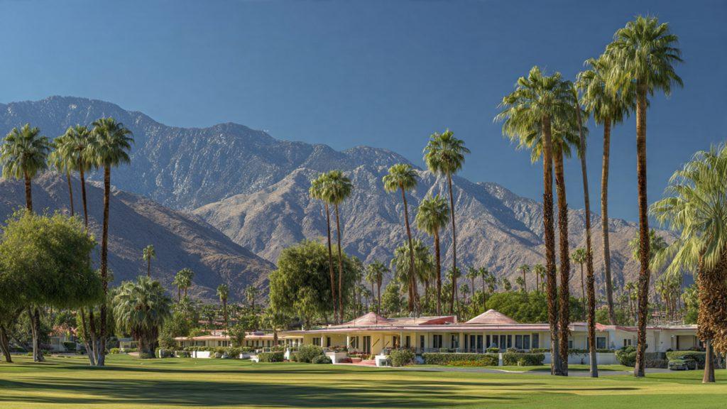 Thunderbird Country Club Rancho Mirage California, classic desert golf course with manicured fairways, palm trees, mountain backdrop, mid-century modern clubhouse, sunny day, photorealistic, high detail, 16:9 aspect ratio