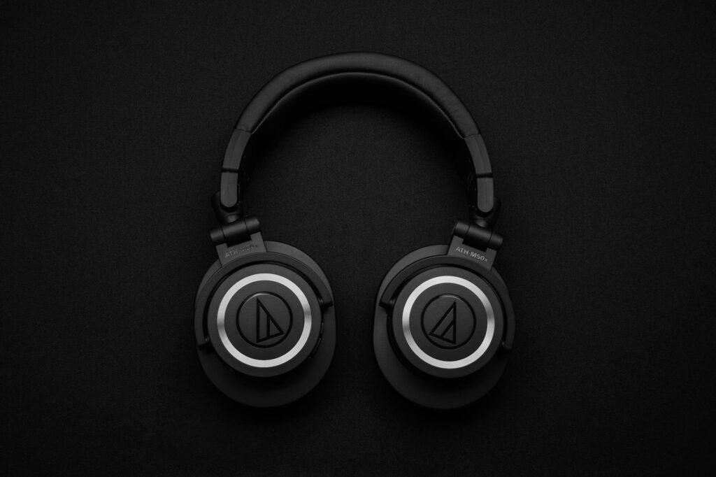 spatial audio top view photo of black wireless headphones