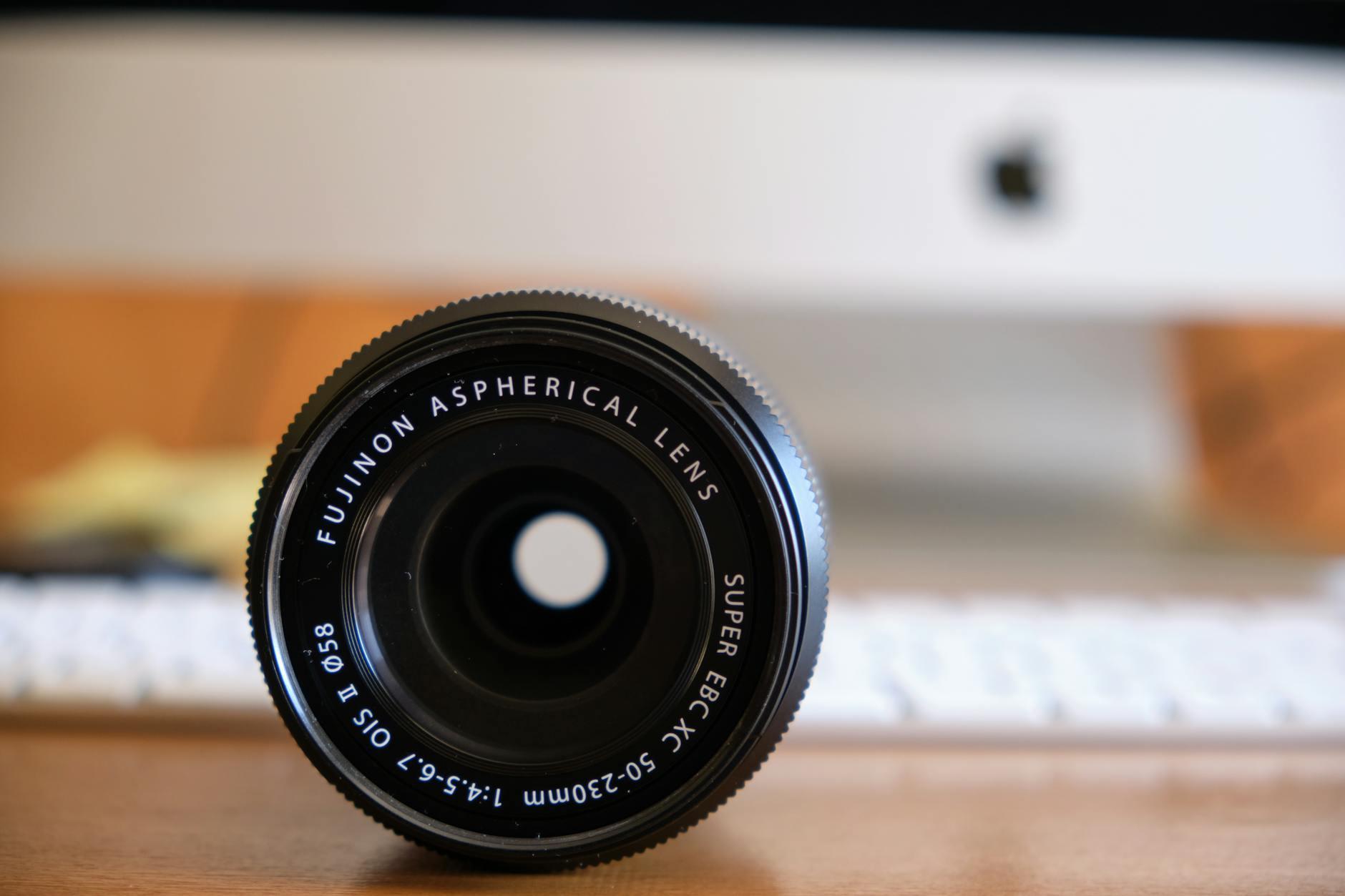 nd filter black camera lens on brown wooden table